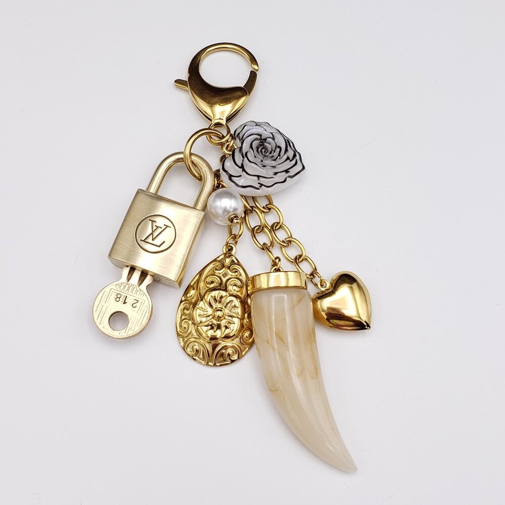 Authentic Louis Vuitton Padlock w/Unbranded Resin Horn Stainless Steel Keycharm